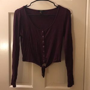 Long sleeve maroon crop top.